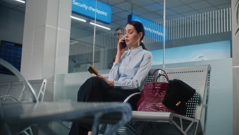 woman waiting at airport security checkpoint