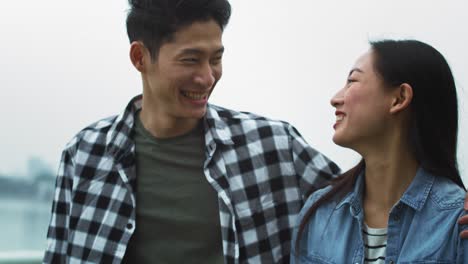 Handheld-view-of-Vietnamese-young-couple-having-great-time