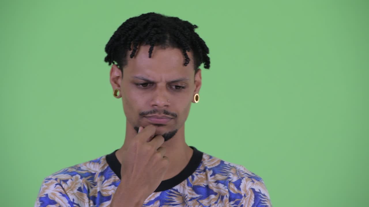 Young handsome African man with dreadlocks