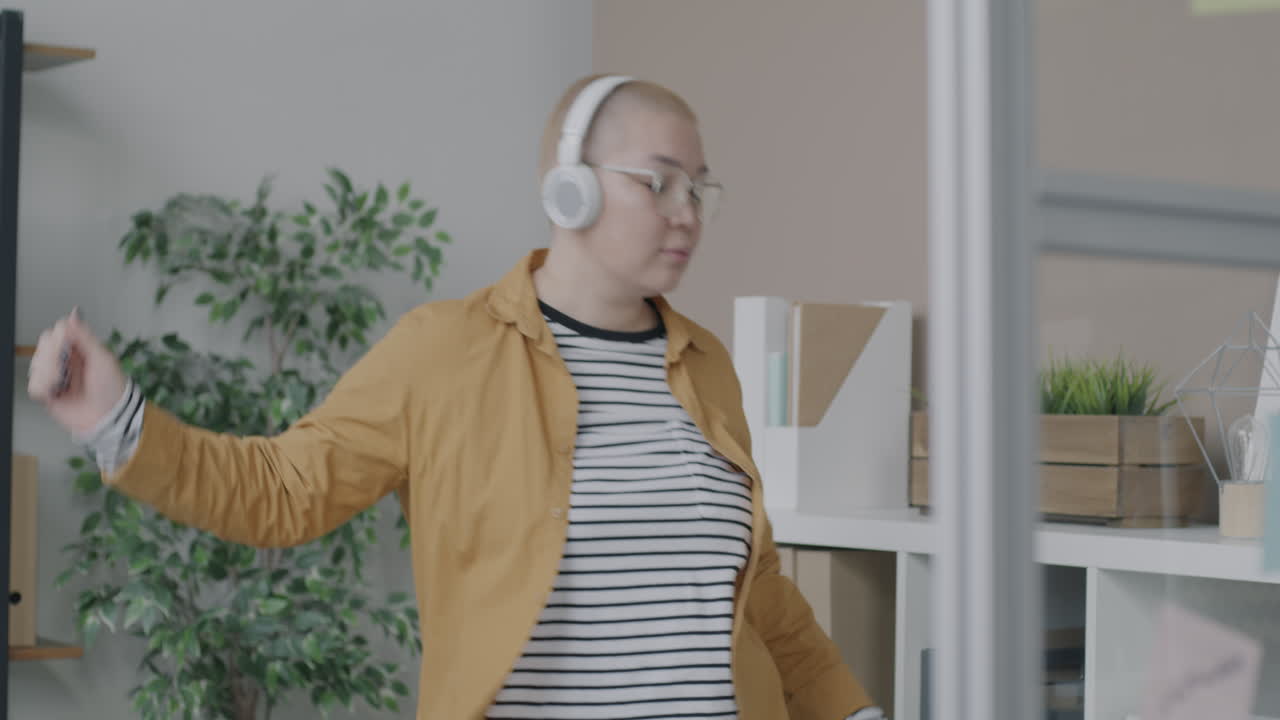 Woman Dancing in Office