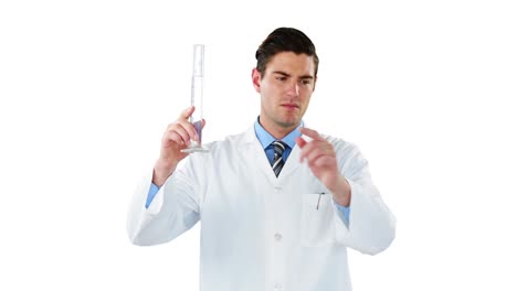 Doctor-using-digital-screen-while-examining-chemical-in-test-tube