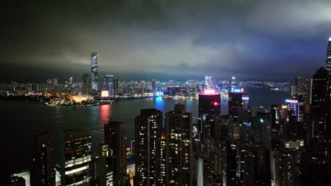 a view of a city at night from the top of a building