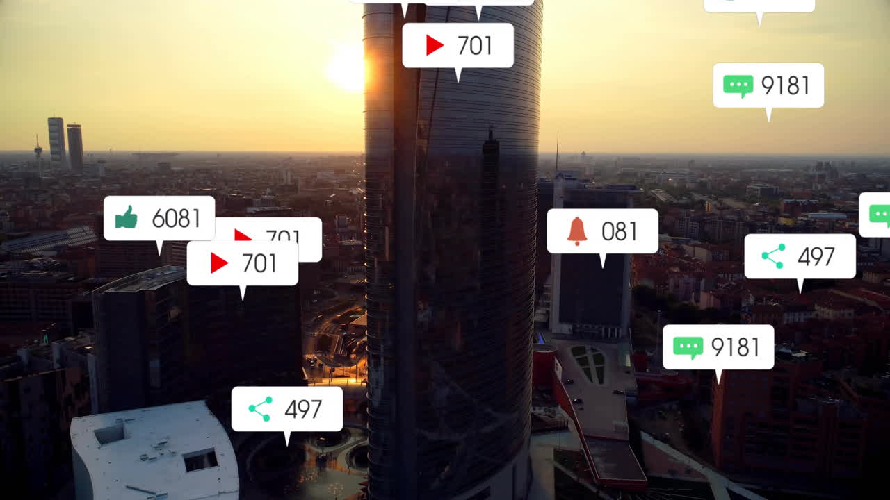 Social media notifications animation over cityscape with skyscrapers at sunset