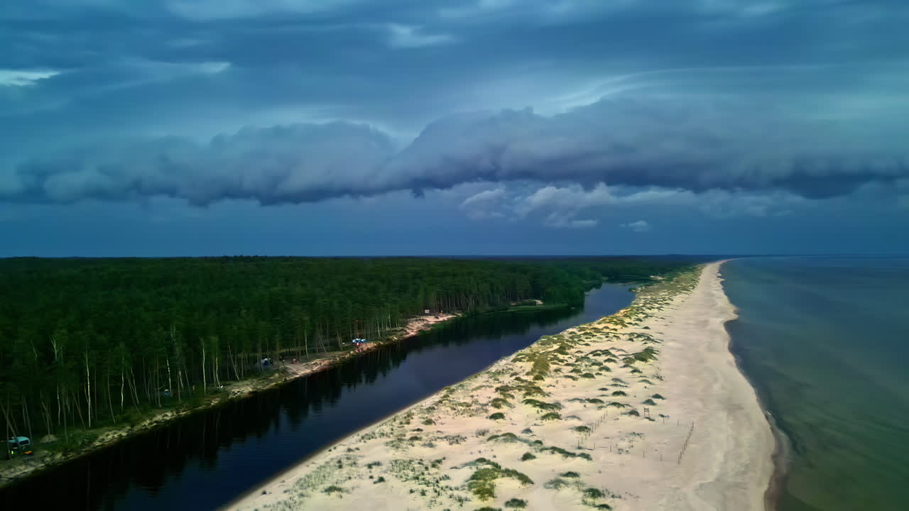 Stormy Sky Over a Coastal River and Beach
