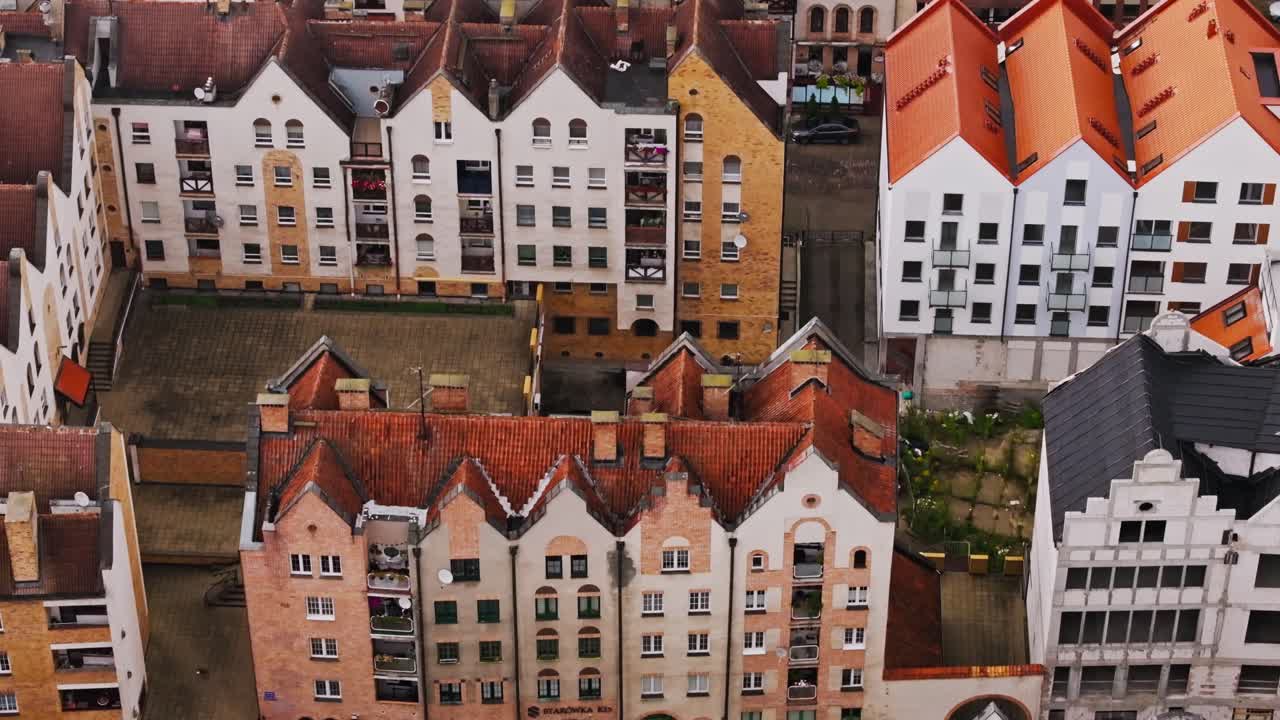 Aerial tele view of Elblag rooftops with red tiles, cultural heritage Europe