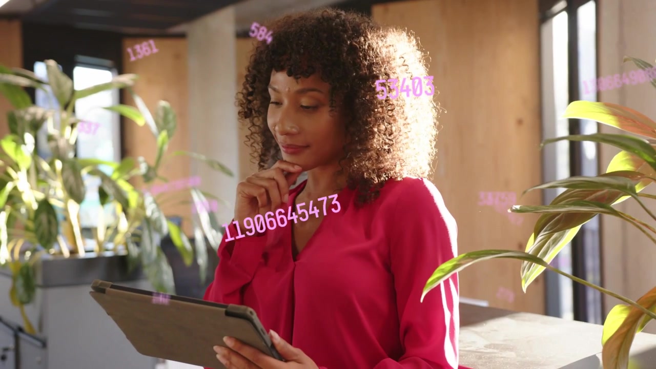 Woman glancing, tapping and swiping tablet while analyzing biz data, numbers floating around her
