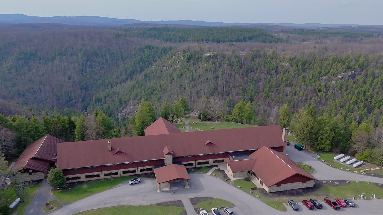 Smokehouse building at Blackwater Falls State Park in forested ridge location, USA