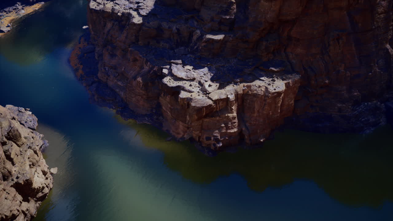 Dramatic rock formations and tranquil waters at a river bend