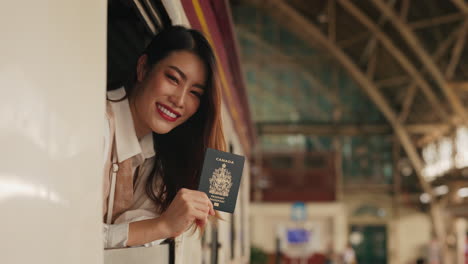 woman with canadian passport at train station