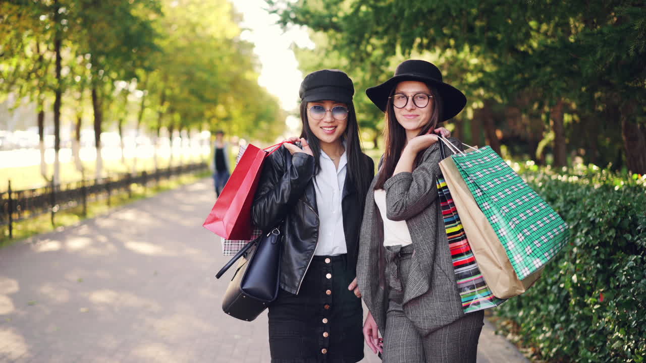 Two Friends Shopping in a Park