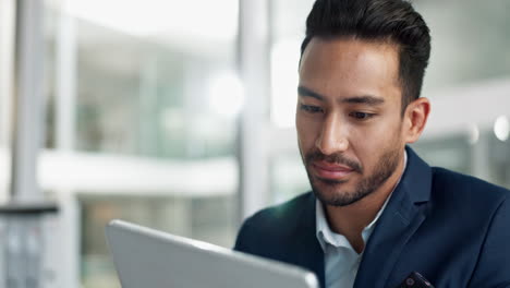 businessman using a tablet in an office