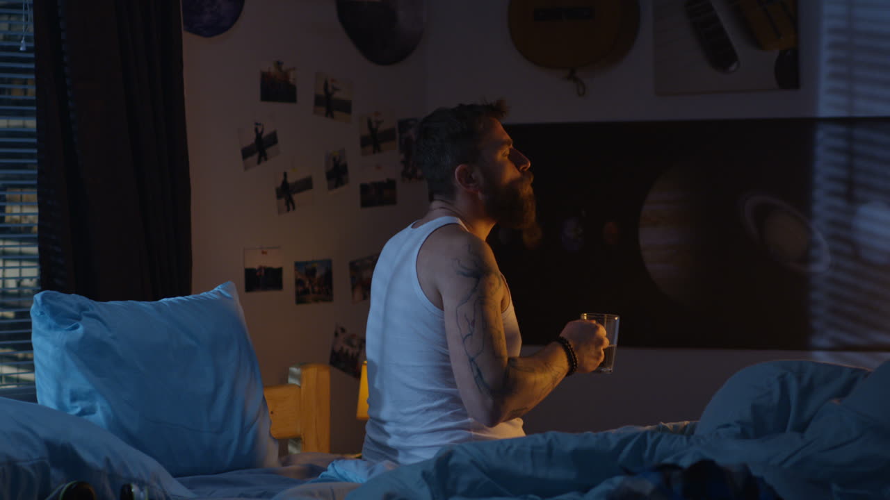 Teenager Depressed and Stressed in Bedroom at Night