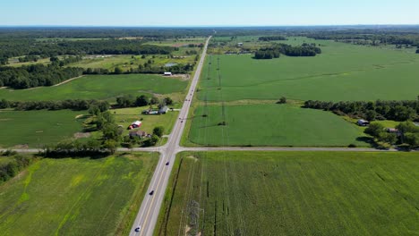 Wide-angle-aerial-view-cars-on-rural-country