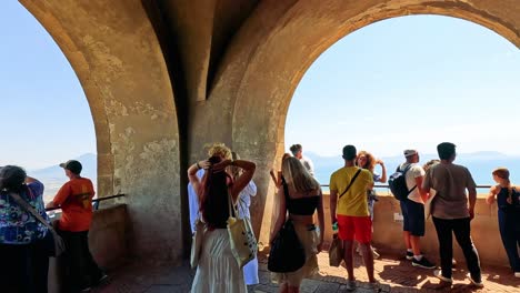 people gather at a lookout in naples