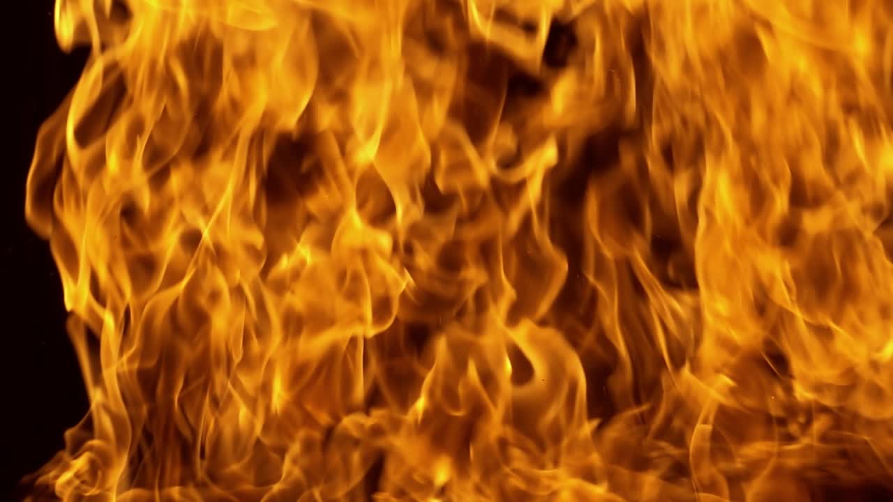 Flames of fire on black background in slow motion