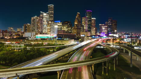 aerial hyperlapse drone fly above highway of houston texas usa at night lighting