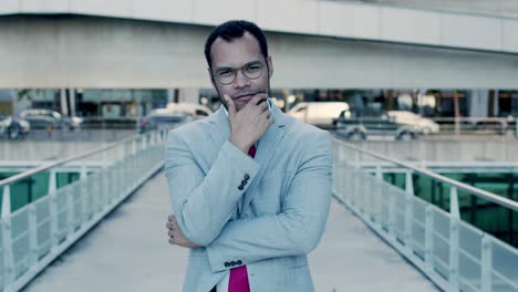 Content-businessman-smiling-at-camera