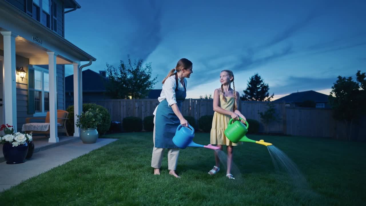 Entering mother apron and daughter yellow dress, tilting blue and green cans, watering lawn at dusk