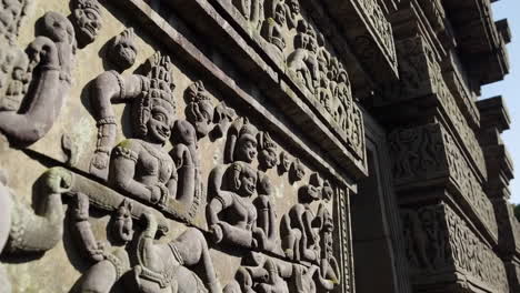 stone carvings on ancient temple wall
