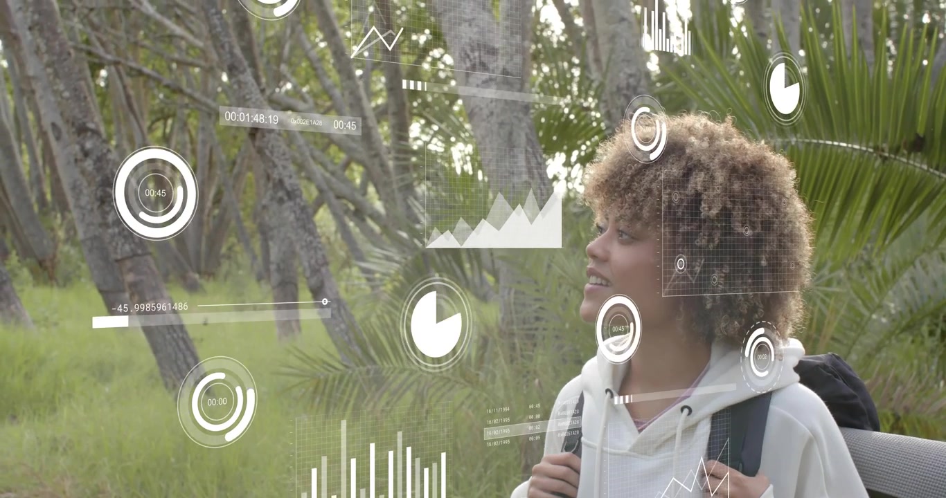 Woman standing on trail scanning as transparent AR overlay appears, viewing charts for analysis