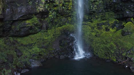 mossy rocks surrounding amidaga falls, gifu japan