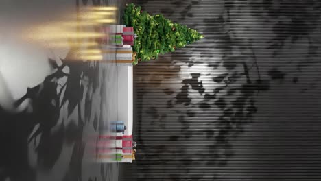 árbol de navidad con adornos y regalos envueltos en un piso negro contra un fondo negro