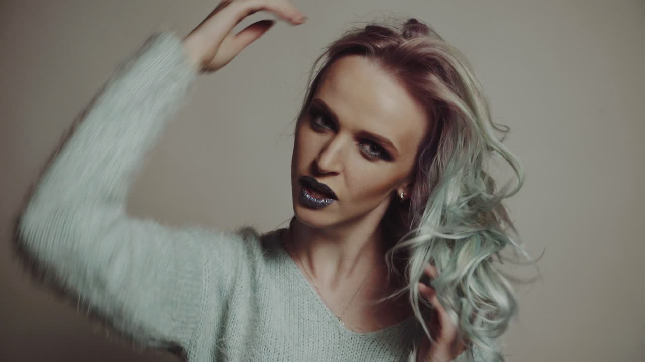 Portrait of a Beautiful Girl with Dyed Hair,. Beauty fashion model girl with colorful dyed hair. Colourful long hair.