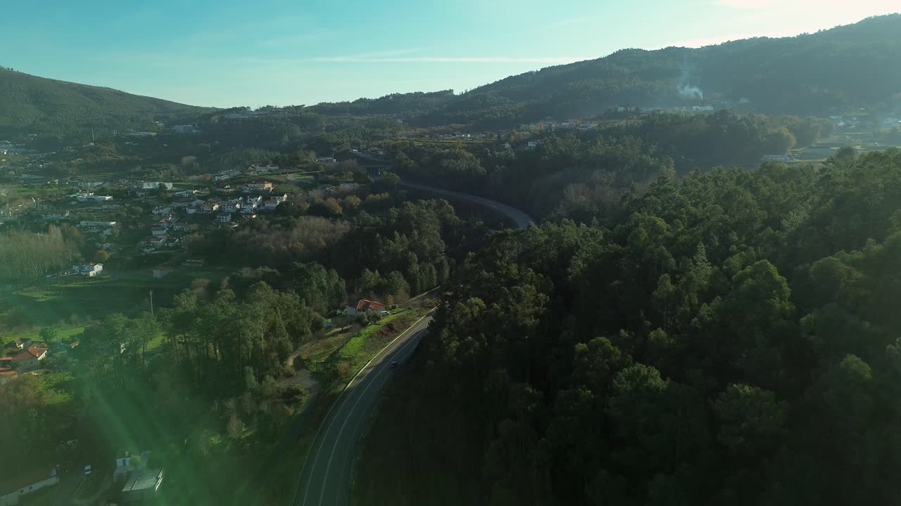 Modern highway infrastructure in a rural European setting. Aerial view of a well-paved road connecting the remote town of Arouca to the main Portuguese transport network