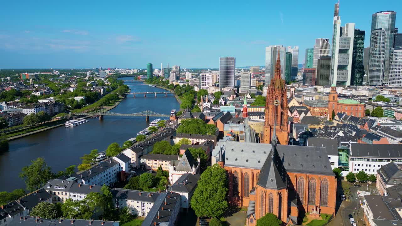 4K Aerial Drone Video of the Kaiserdom St. Bartholomäus Church on the banks of the Main River in Downtown Frankfurt, Germany