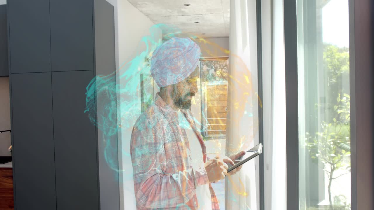 Man tapping tablet, activating teal amber animated swirls around window and torso for smart home