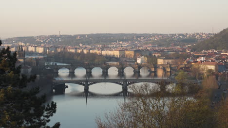 bridges over vltava river in prague city center,czechia,sunrise,from letná park