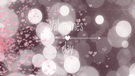 Heart and arrow animation over pink bokeh for Valentine's Day theme