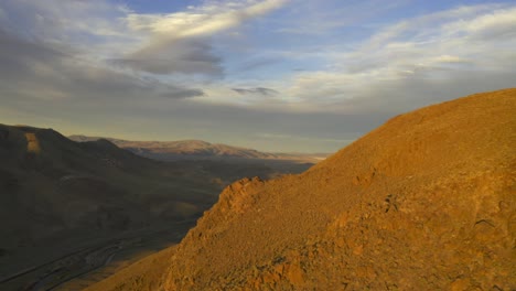 beautiful 4k aerial footage of nevada desert mountains outside of reno during sunset