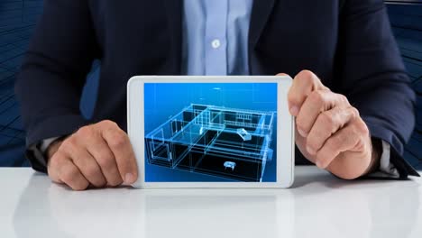 hombre de negocios con una tableta que muestra un video de construcción