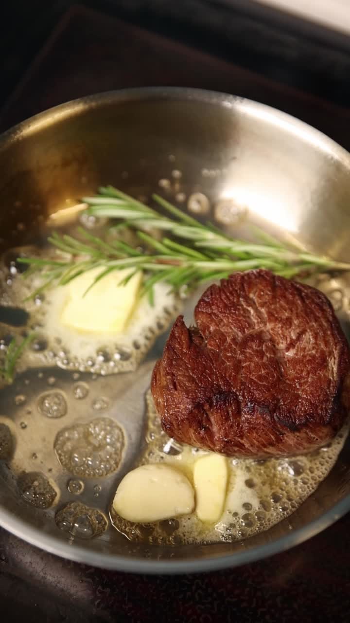 Steak with Butter, Rosemary, and Garlic in a Pan