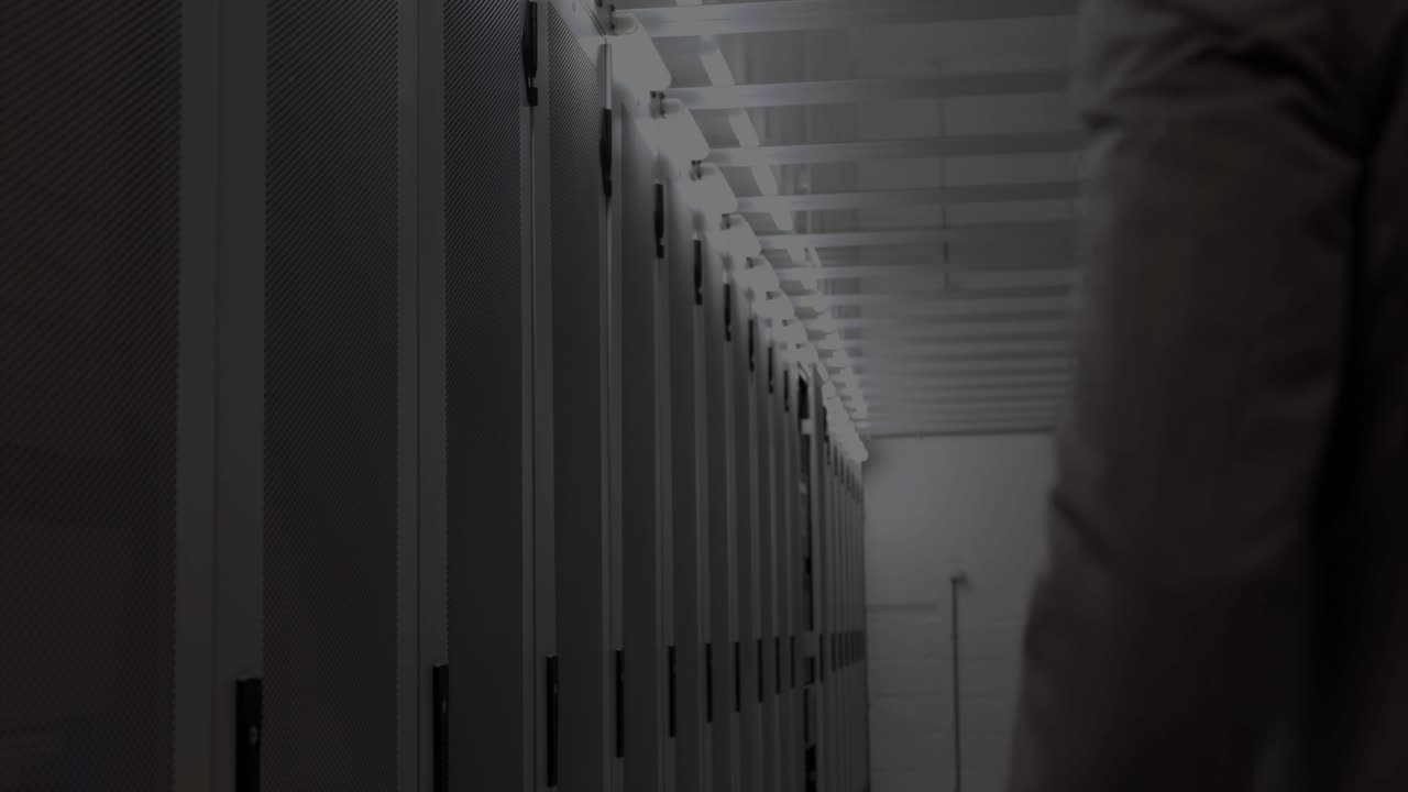 Entering data center aisle, IT admin walking, checking racks, HUD showing charts and readouts