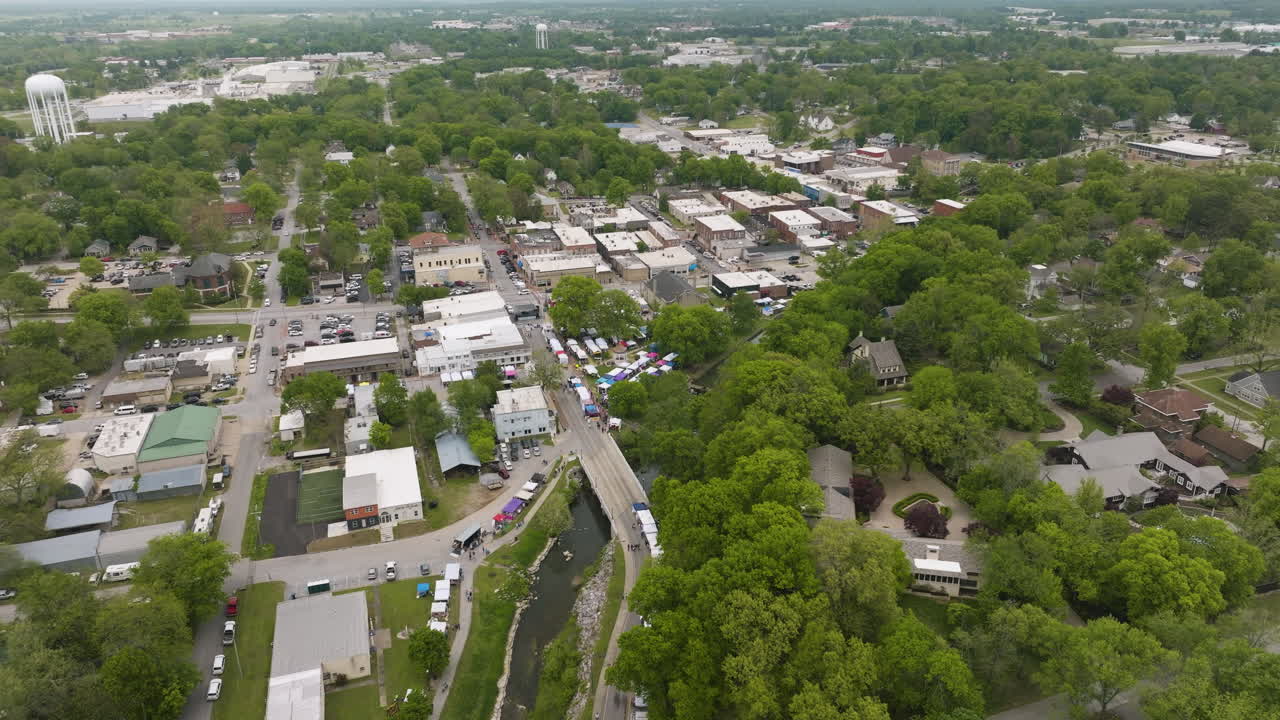 View From Above Of Sager Creek And Downtown Siloam Springs During Dogwood Festival Event In Arkansas, USA