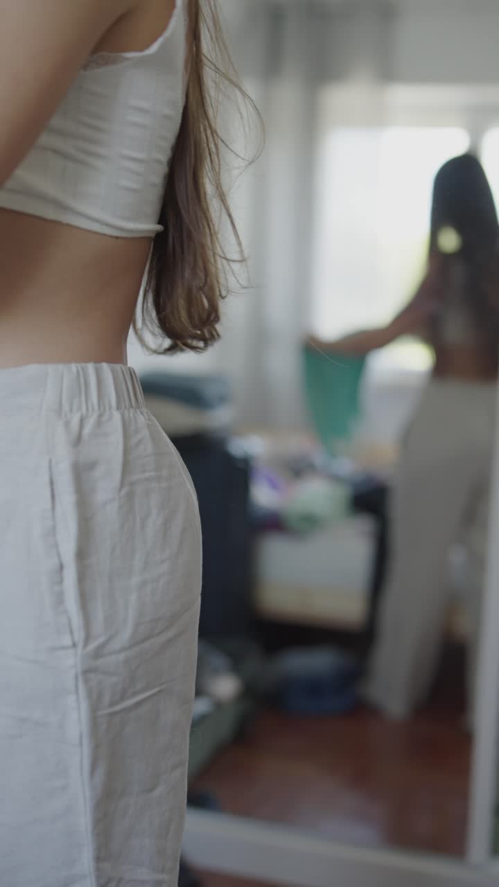 Woman getting dressed