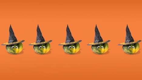 seamless pattern animation of five pumpkins with googly eyes and witch hats, funny movement in different directions. halloween concept with copy space on orange background