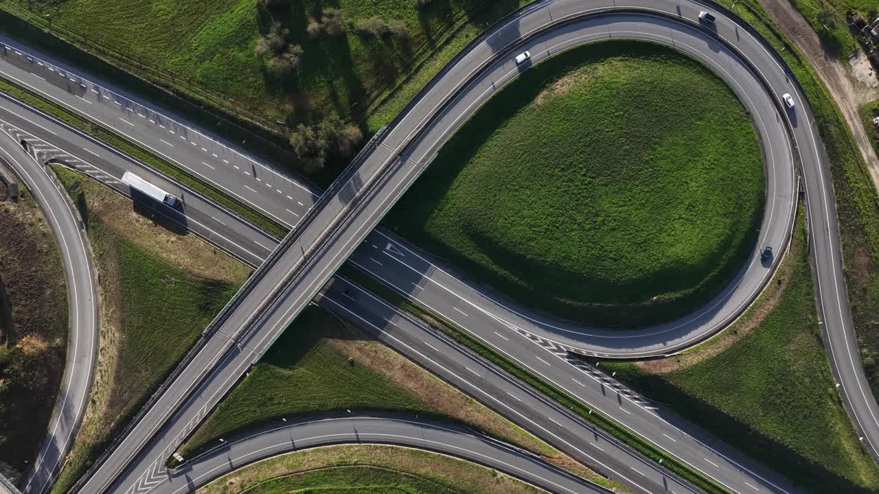 Highway exit roads intersection with cars and truck