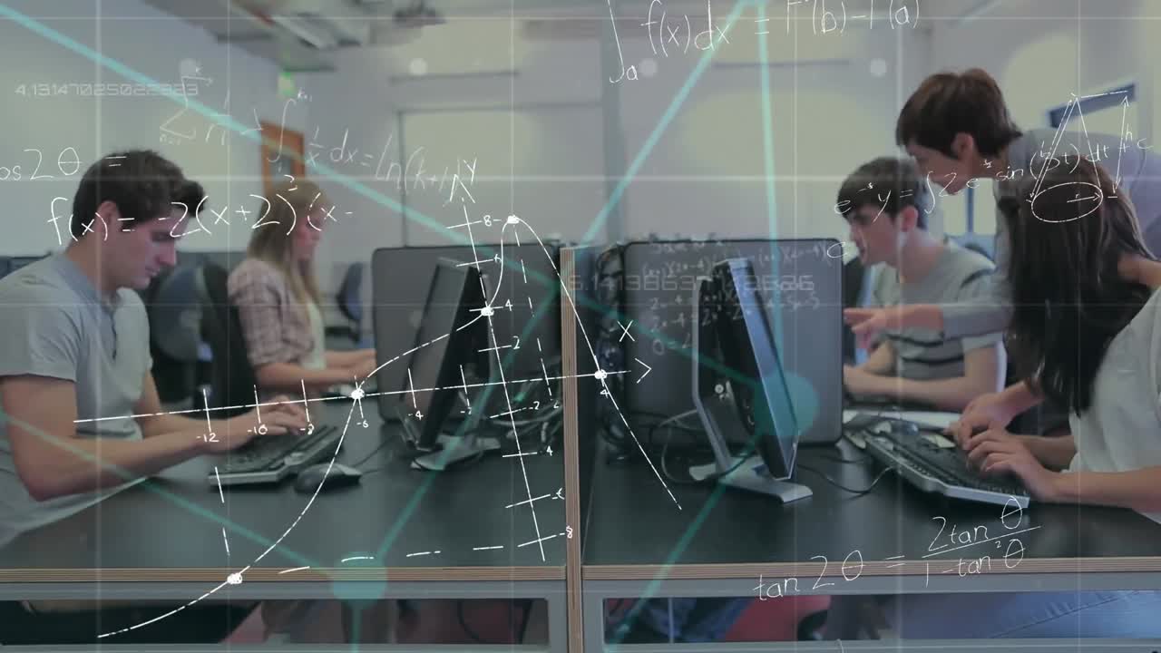 컴퓨터 앞 에 앉아 있는 대학생 들