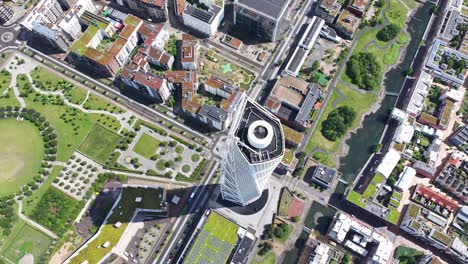 Turning-Torso,-Malmo-skyscraper-aerial-orbit-top-down-reveal-crazy-symmetry-on-tall-construction