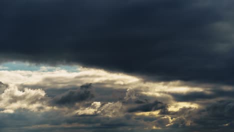 beautiful dark dramatic sky with stormy clouds time lapse before the rain or snow, winter season