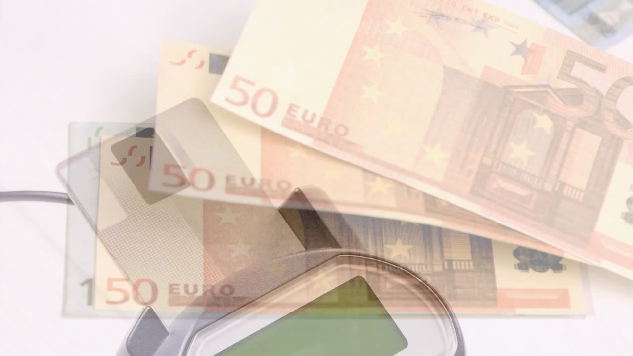 지불 터미널 위로 떨어지는 유로 지폐의 애니메이션