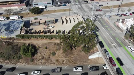 firefighters working to extinguish brushfire on los angeles freeway