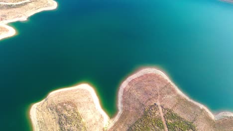 aerial-view-of-blue-dragon-river,-portugal,-4k