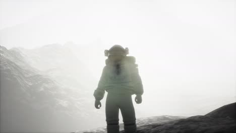 astronaut on another planet with dust and fog