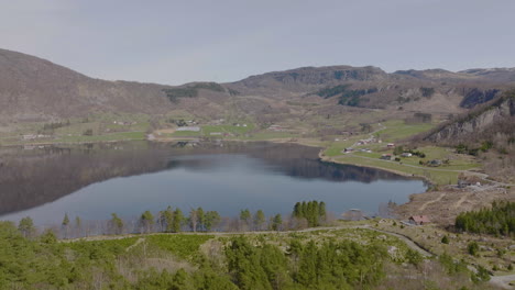 small farmland and rural settlement on lakeside