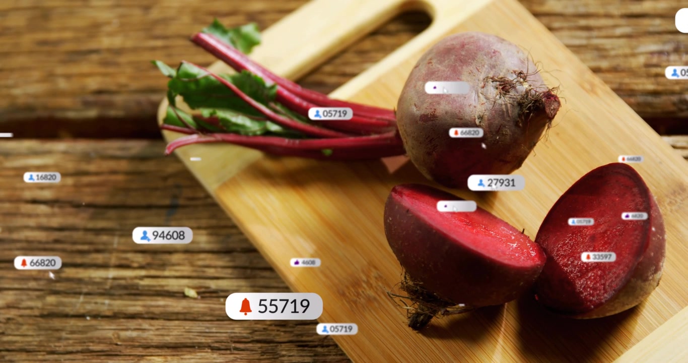 Alerts launching heart and bell badges across table, clustering over beets for food marketing