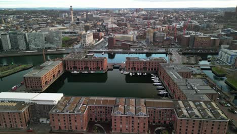 albert dock, liverpool at sunrise - slow aerial drone anticlockwise rotate